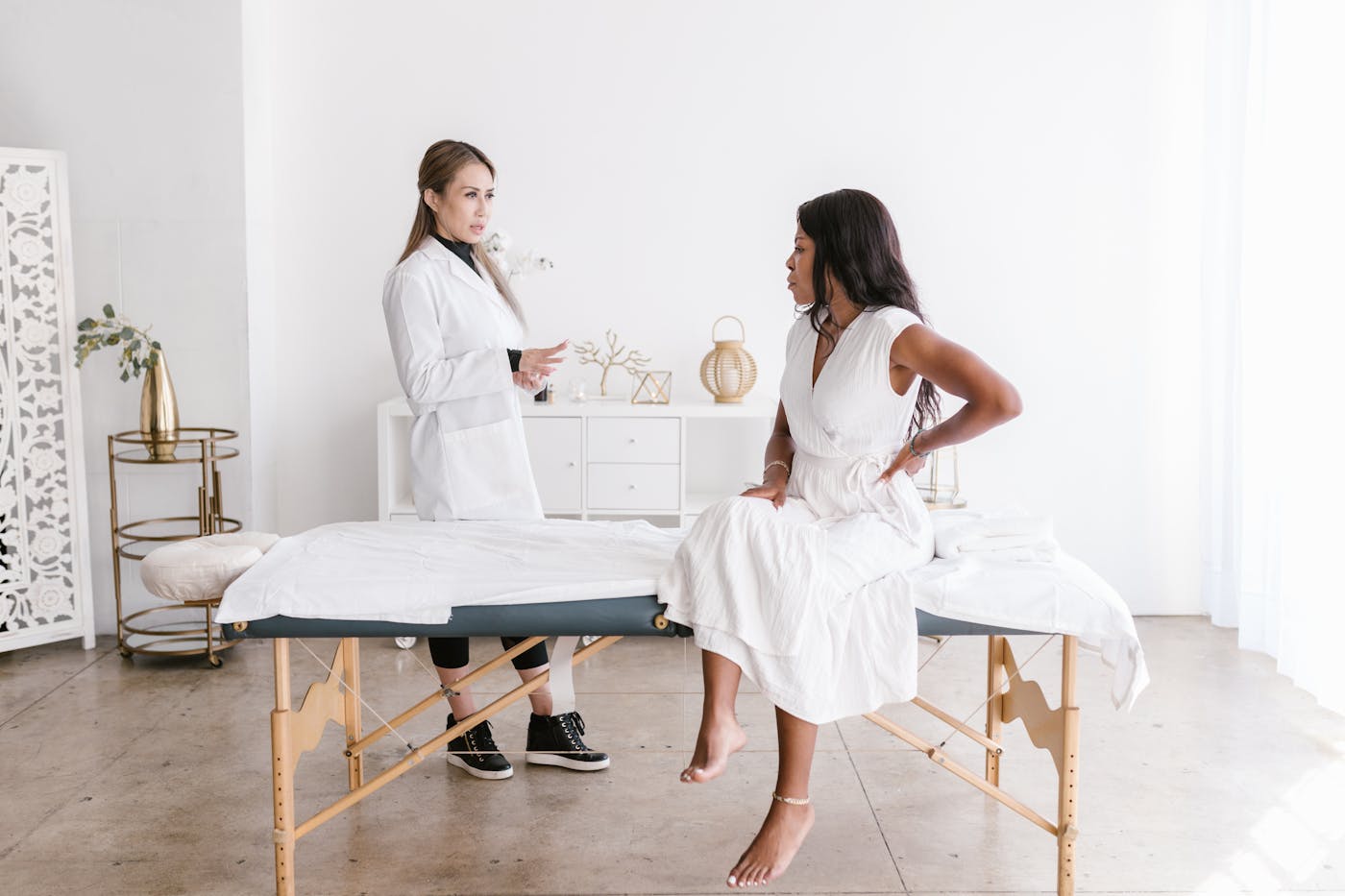 Doctor speaking with a patient in a consultation room